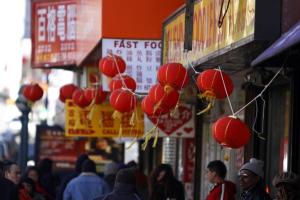 Noonan, Jeanne Freelance NYDN/Noonan, Jeanne Freelance NYDN The Lunar New Year holiday is important for merchants in Flushing who depend on shoppers. The area is festooned with red laterns and other decorations.